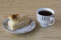 Cup of tea and a puff pastry Royalty Free Stock Photo