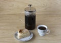 Cup of tea with a puff pastry and french press Royalty Free Stock Photo