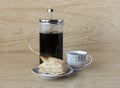 Cup of tea with a puff pastry and french press Royalty Free Stock Photo