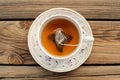 A cup of tea with a pyramid tea bag Royalty Free Stock Photo