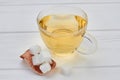 Cup of tea and refined sugar on a wooden background. Royalty Free Stock Photo