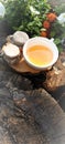 a cup of tea with a saucer on a wooden stand with a jar of honey Royalty Free Stock Photo