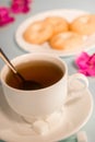 A cup of tea with shortbread cookies