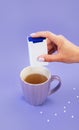 A cup of tea with sweetener Royalty Free Stock Photo