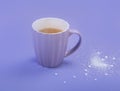 A cup of tea with sweetener and sugar Royalty Free Stock Photo
