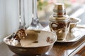 cup of tea and teapot roll of paper on the table kitchen