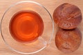 Cup of tea and two fresh buns Royalty Free Stock Photo