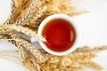 A cup of tea and wheat ears and. Royalty Free Stock Photo