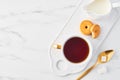 Cup of tea on white marble table top. Royalty Free Stock Photo