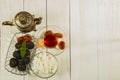 A cup of tea on a white table.Traditional Arabic, Turkish Ramadan tea with dry dates and raisins on a wooden white table. Turkish Royalty Free Stock Photo