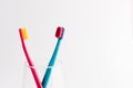 Manual Regular Toothbrush Against Modern Electric Toothbrush. Royalty Free Stock Photo