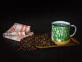 a cup of traditional Indonesian coffee on a black background