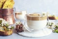 Cup of Trendy whipped cream cold dalgona coffee and Italian biscotti on light grey background Royalty Free Stock Photo