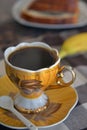 Cup of Turkish coffee and slices of poppy seeds strudel rolls