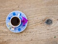 A cup of Turkish coffee with sweets and spices on a wooden surface Royalty Free Stock Photo