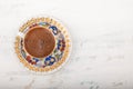 A cup of Turkish coffee on wooden surface Royalty Free Stock Photo