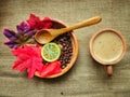 A cup of warm cappuccino drink is prepared from real coffee beans and decorated with beautiful roses Royalty Free Stock Photo