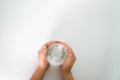 A cup of water and two hands holding it Royalty Free Stock Photo