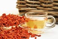 Cup of wolfberry tea Royalty Free Stock Photo