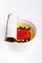 Cup of Zuppa inglese dessert with cocoa biscuit