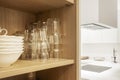 Cupboard with wooden shelf full