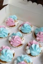 Cupcake blue and pink for gender party. boy or girl. delicious cupcakes with blue and pink cream, golden sparkles