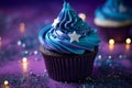 Cupcake with blue galaxy frosting with stars