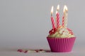 Cupcake with burning candles Royalty Free Stock Photo