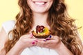 Cupcake cake in woman hand. Sweet food. Royalty Free Stock Photo