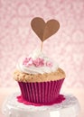 Cupcake with a cakepick Royalty Free Stock Photo