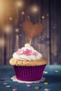 Cupcake with a cakepick Royalty Free Stock Photo