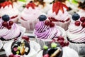 Cupcake cakes with fresh berries on the counter