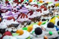 Cupcake cakes with fresh berries on the counter