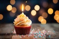 Cupcake with candle, birthday delight, bokeh lights backdrop, festive