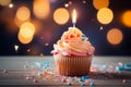 Cupcake celebration, birthday delight, candle on bokeh background, festive