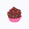 Cupcake with chocolate ganache and red berry