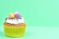 Cupcake with chocolate small eggs