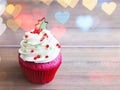 Cupcake with christmas tree shape on wooden table Royalty Free Stock Photo