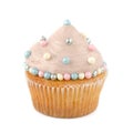 Cupcake decorated with cream and sugar pearls Royalty Free Stock Photo