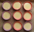 Cupcake dough in silicone molds before the oven Royalty Free Stock Photo