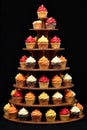 Cupcake Family Tree Sweet Heritage A stylized, tiered structure resembling a tree, with various cupcakes Royalty Free Stock Photo