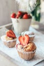 Cupcake with fresh strawberry powder with sugar