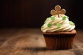 Cupcake with green cream and clover for St. Patrick Day.