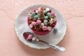 Cupcake made of pills on a white plate and pink tablecloth. Ready-to-eat Royalty Free Stock Photo