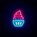 Cupcake neon icon. Bakery logo. Luminous label. Outer glowing effect banner. Isolated vector stock illustration