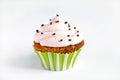 Cupcake with pink cream icing, on white background Royalty Free Stock Photo