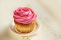 Cupcake with pink rose topview