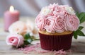 a cupcake is placed beside a gift box Royalty Free Stock Photo