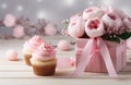 a cupcake is placed beside a gift box Royalty Free Stock Photo