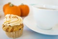 Cupcake and pumpkins and tea